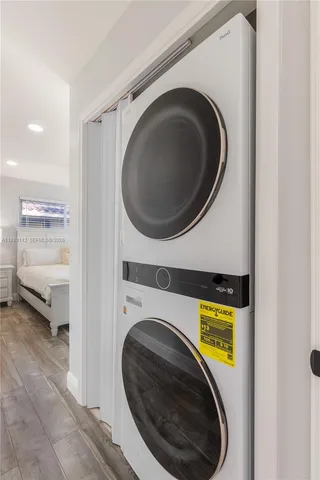 an aerial view of a house with a swimming pool