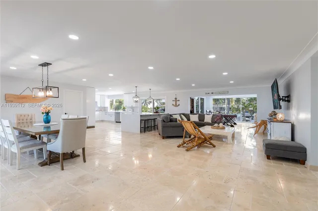 a view of a dining room with furniture window and outside view