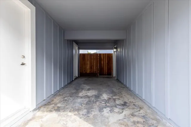 a view of hallway with closet