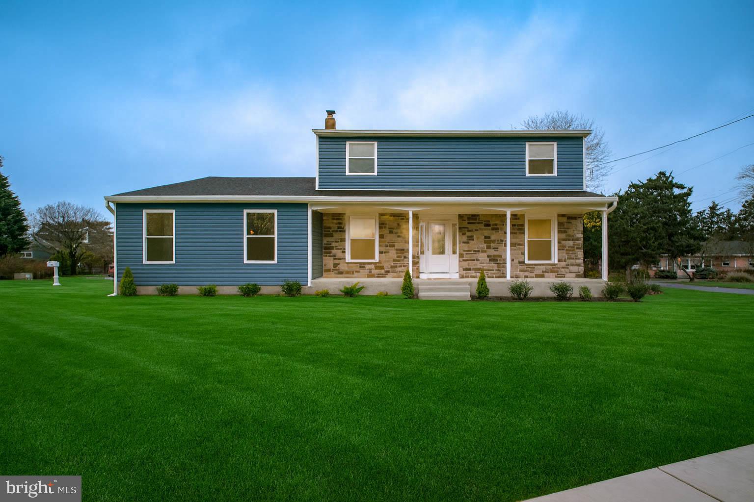125 North Shore Road Marmora, NJ 08223 - Photo 27 of 27 a front view of a house with a yard