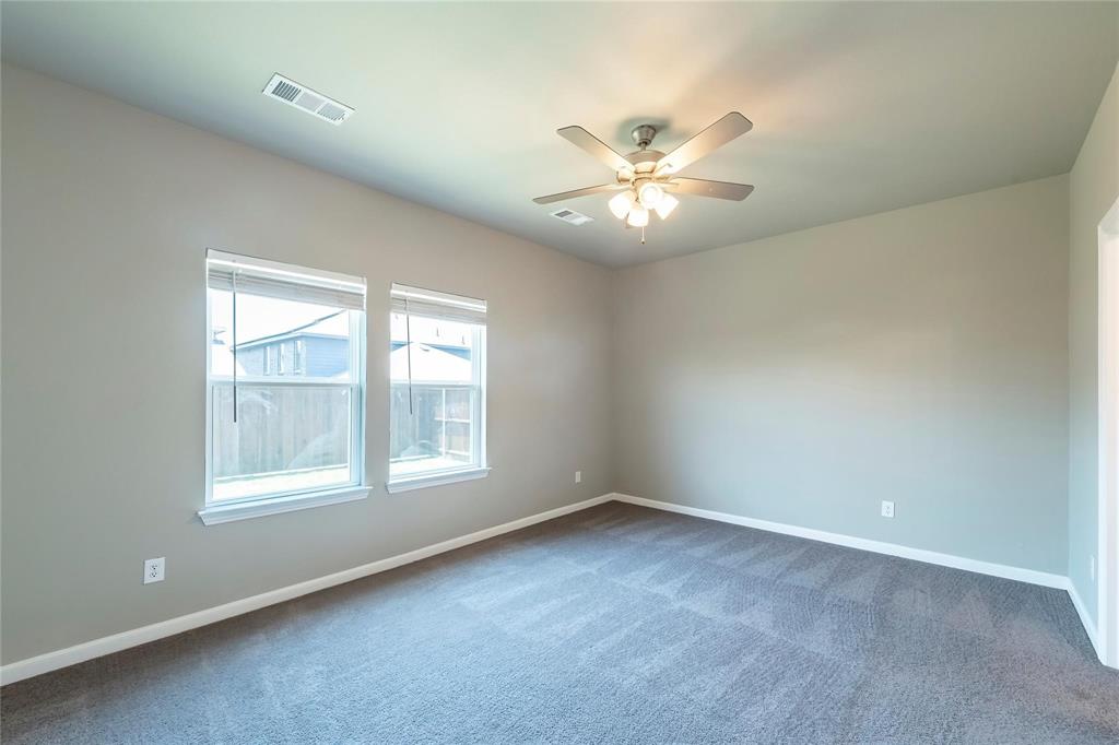 2069 Hartley Drive Forney, TX 75126 - Photo 18 of 27 a view of an empty room with a window