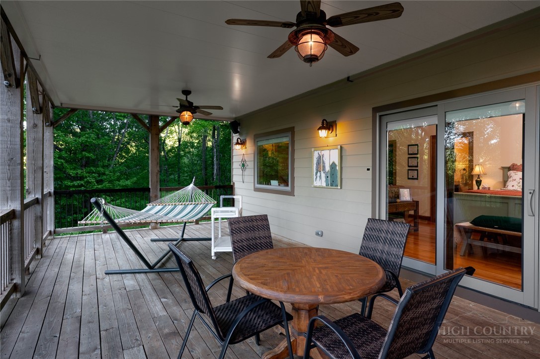 171 Camp Davis Road Banner Elk, NC 28604 - Photo 46 of 48 a view of a dining room with furniture window and outside view