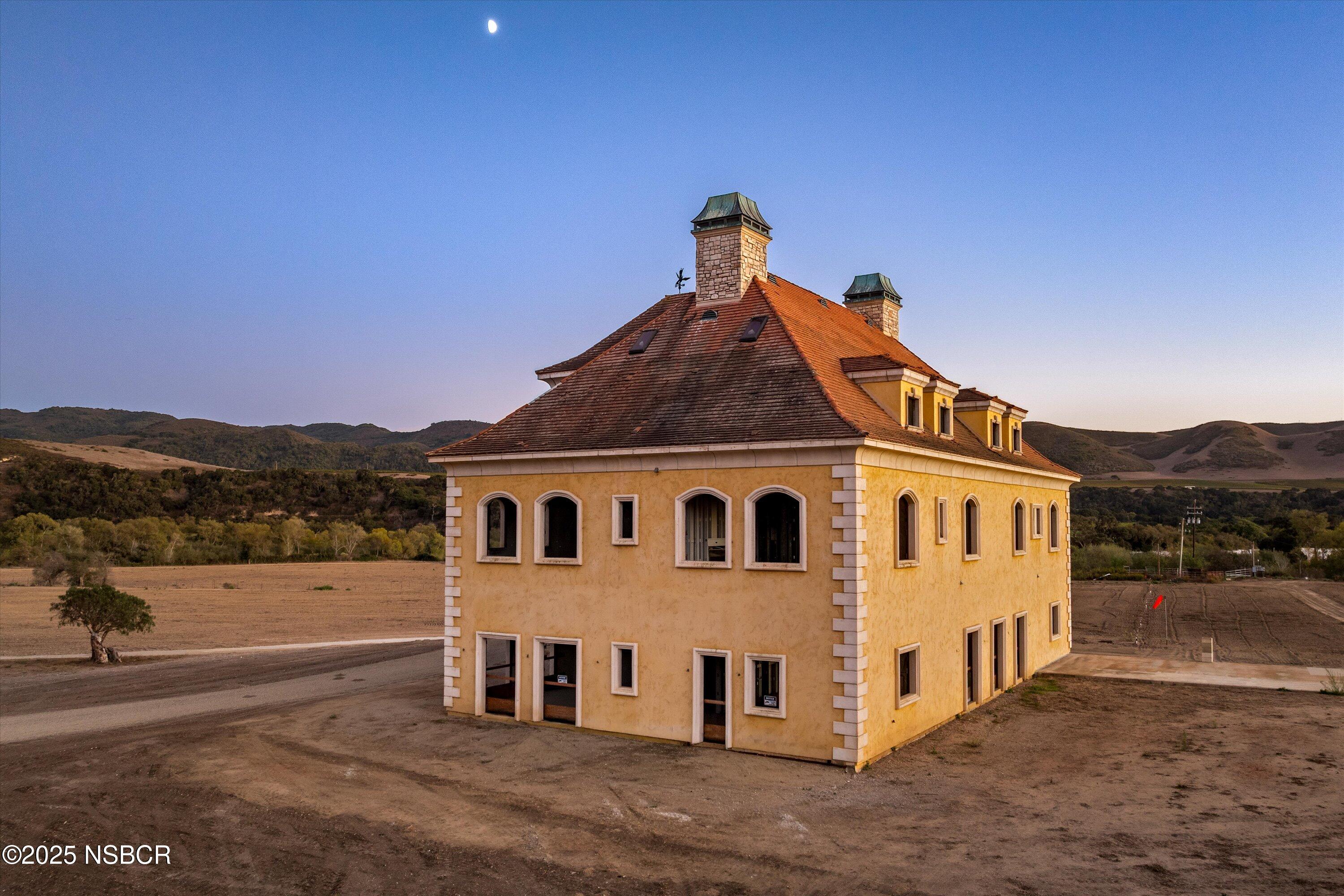 4375 Sweeney Road Lompoc, CA 93436 - Photo 65 of 70 a view of a white house with a yard