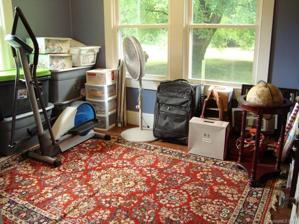 85 Wall Road Tryon, NC 28782 - Photo 12 of 22 a room with furniture a window and a fireplace