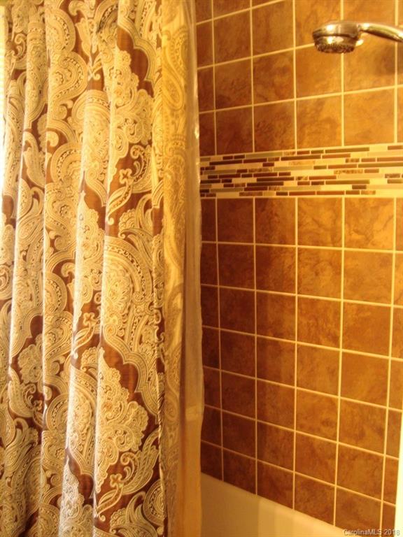 85 Wall Road Tryon, NC 28782 - Photo 13 of 22 a bathroom with a shower