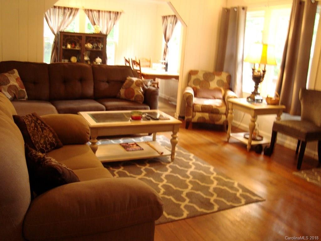 85 Wall Road Tryon, NC 28782 - Photo 4 of 22 a living room with furniture and a large window