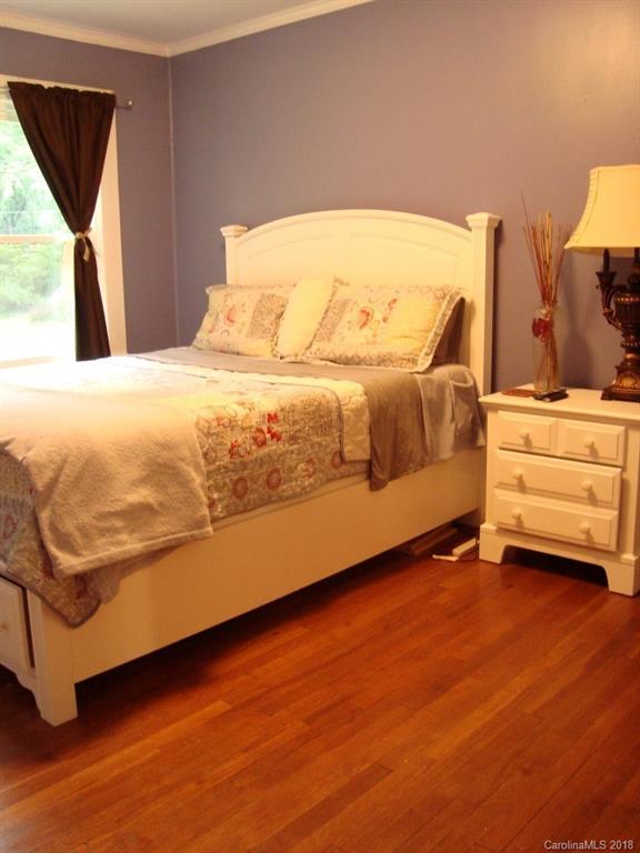 85 Wall Road Tryon, NC 28782 - Photo 10 of 22 a bedroom with a bed and a window