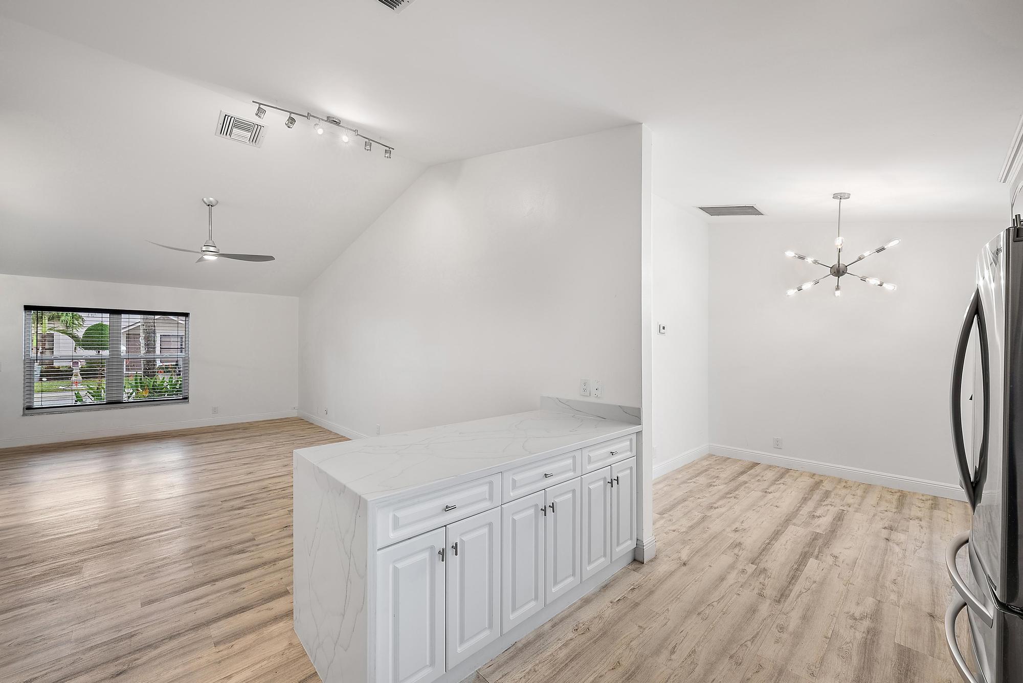 14576 Sunset Pine Drive Delray Beach, FL 33445 - Photo 7 of 23 Kitchen, Dining, Living Room