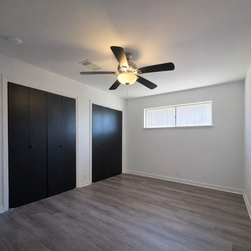 1820 Sunset Avenue Bay City, TX 77414 - Photo 15 of 26 Secondary bedroom with 2 closets for plenty of storage