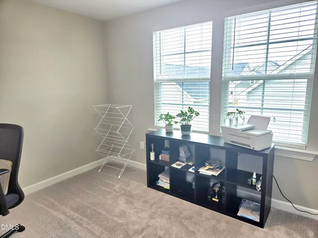a bathroom with a sink toilet and mirror