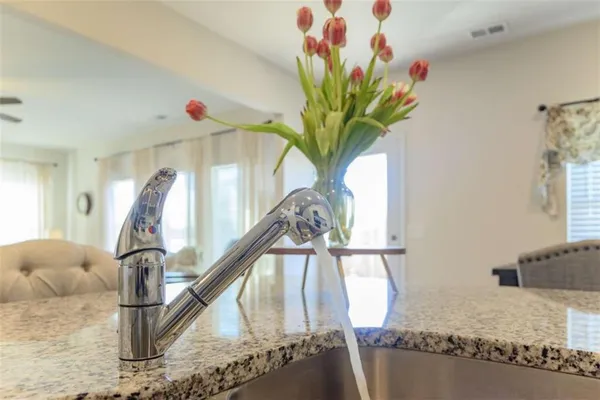 a vase of flowers sitting on a table