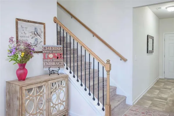 a view of entryway with wooden floor