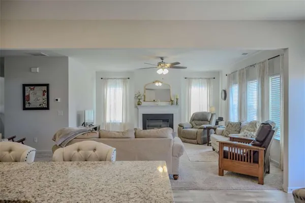 a bedroom with furniture and a chandelier
