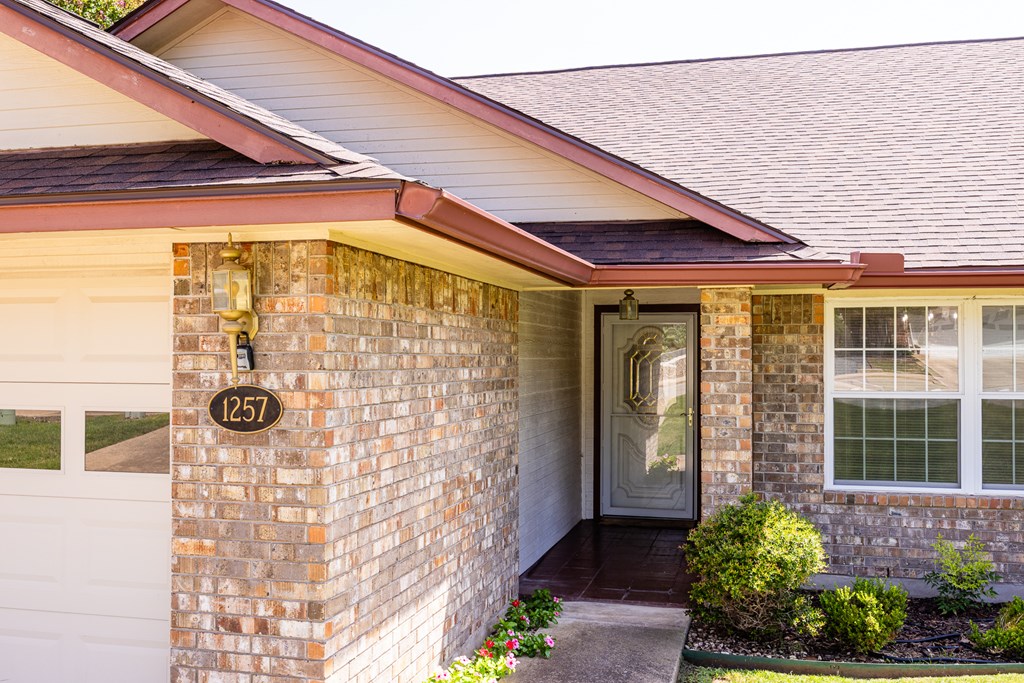 1257 Victory Kerrville, TX 78028 - Photo 31 of 31 a front view of a house with large windows
