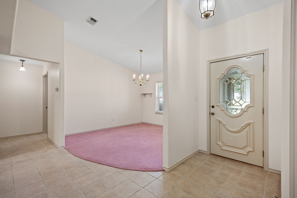 1257 Victory Kerrville, TX 78028 - Photo 5 of 31 an empty room with cabinet and mirror