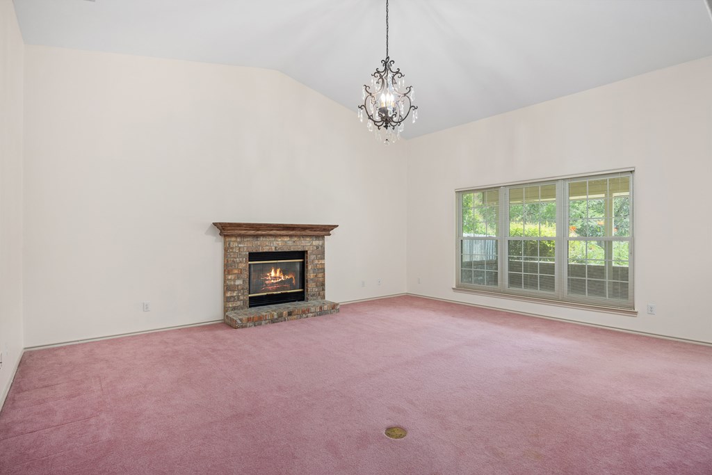1257 Victory Kerrville, TX 78028 - Photo 6 of 31 a view of a room with windows and fireplace