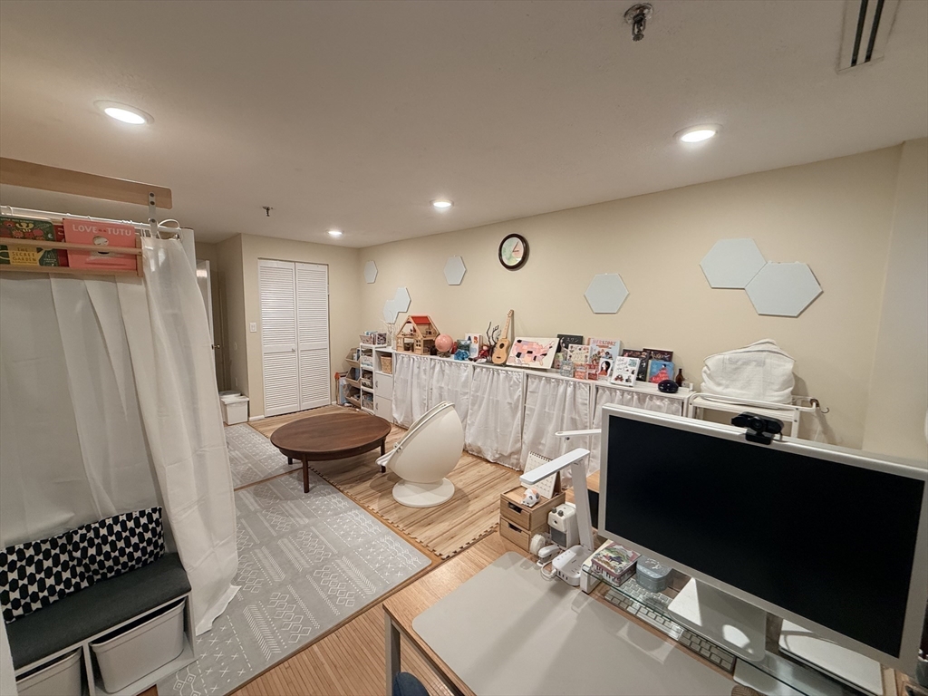 20 Webster Street, Unit 307 Brookline, MA 02446 - Photo 15 of 31 a room with a table chairs and white walls