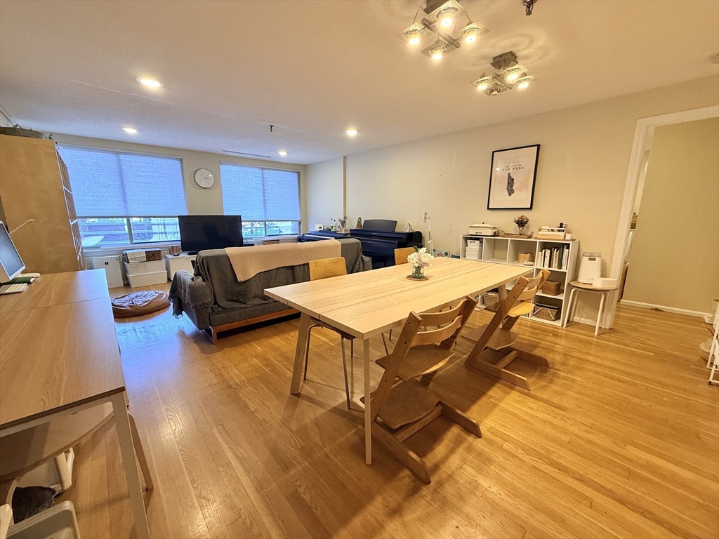 20 Webster Street, Unit 307 Brookline, MA 02446 - Photo 2 of 31 a view of a dining room with furniture and wooden floor