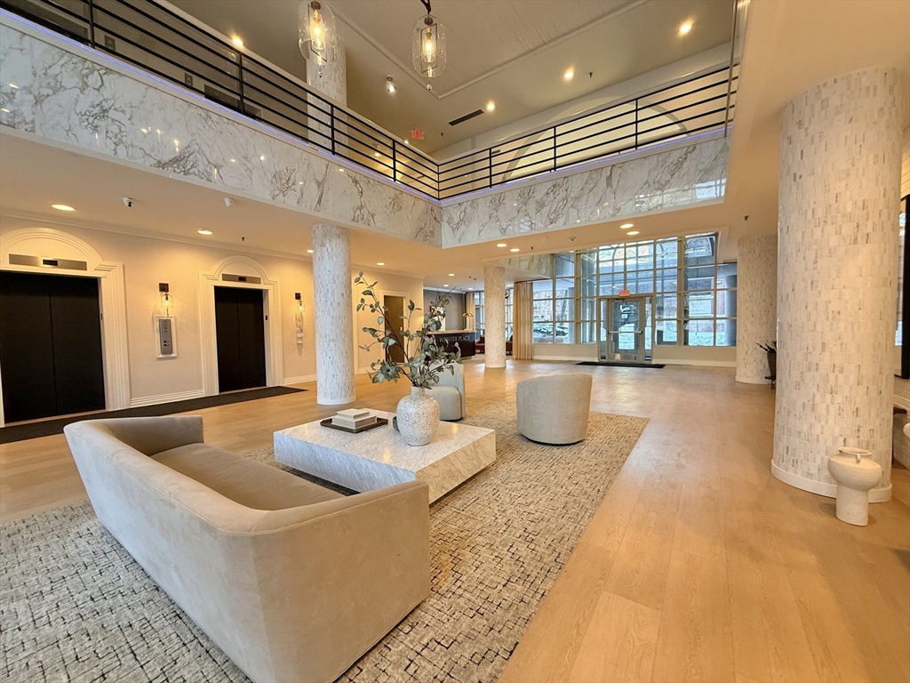 20 Webster Street, Unit 307 Brookline, MA 02446 - Photo 30 of 31 a lobby with furniture and large windows