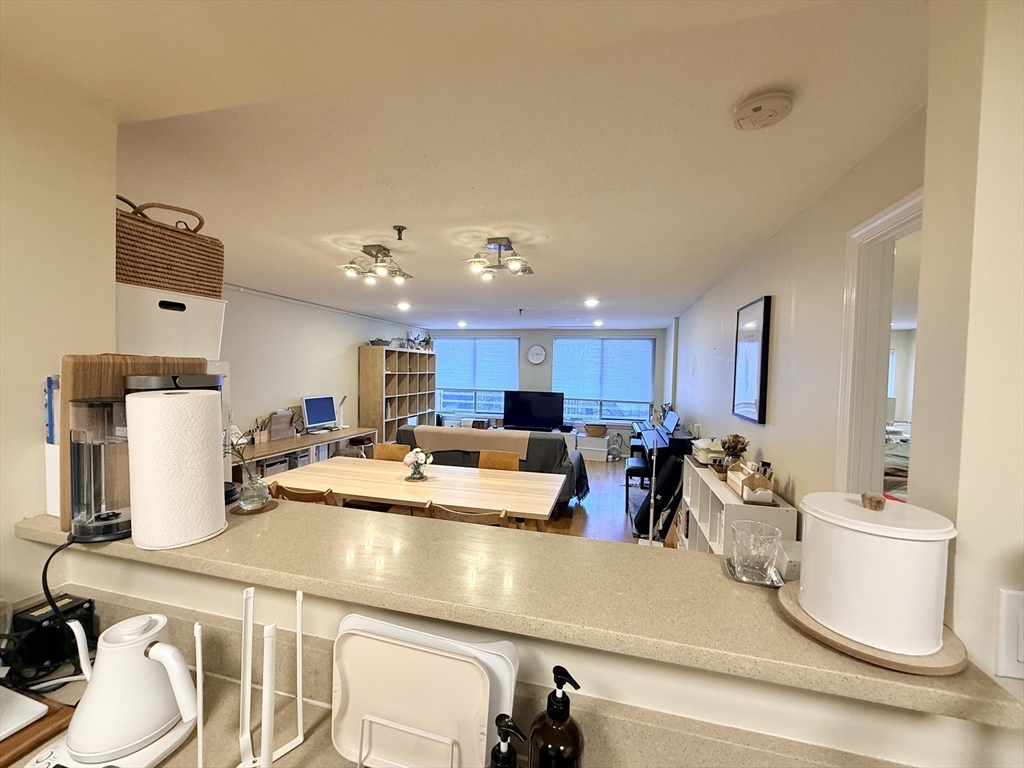 20 Webster Street, Unit 307 Brookline, MA 02446 - Photo 10 of 31 a kitchen with a sink appliances and cabinets