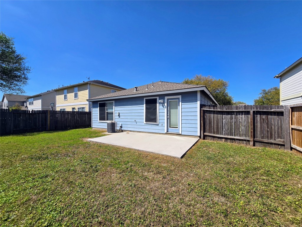 6527 Fairbrook Park Lane Spring, TX 77379 - Photo 14 of 17 a view of a house with a yard and wooden fence