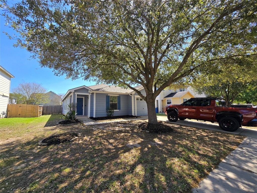 6527 Fairbrook Park Lane Spring, TX 77379 - Photo 16 of 17 a view of a house with a yard