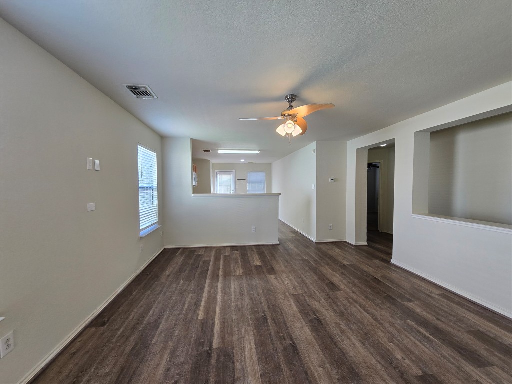 6527 Fairbrook Park Lane Spring, TX 77379 - Photo 2 of 17 wooden floor in an empty room with a window