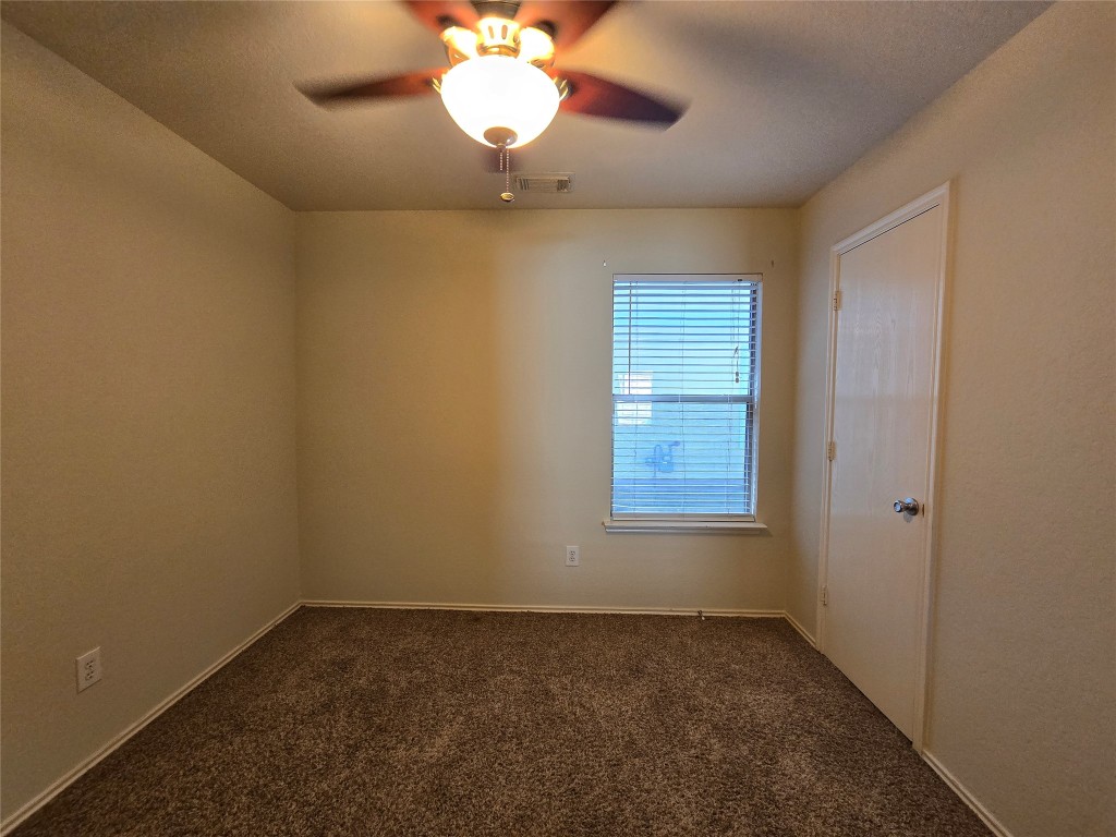 6527 Fairbrook Park Lane Spring, TX 77379 - Photo 5 of 17 an empty room with a window