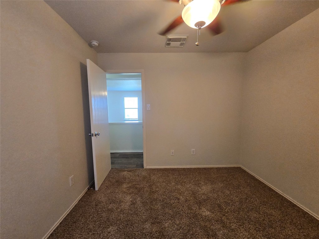 6527 Fairbrook Park Lane Spring, TX 77379 - Photo 6 of 17 an empty room that has a window in it