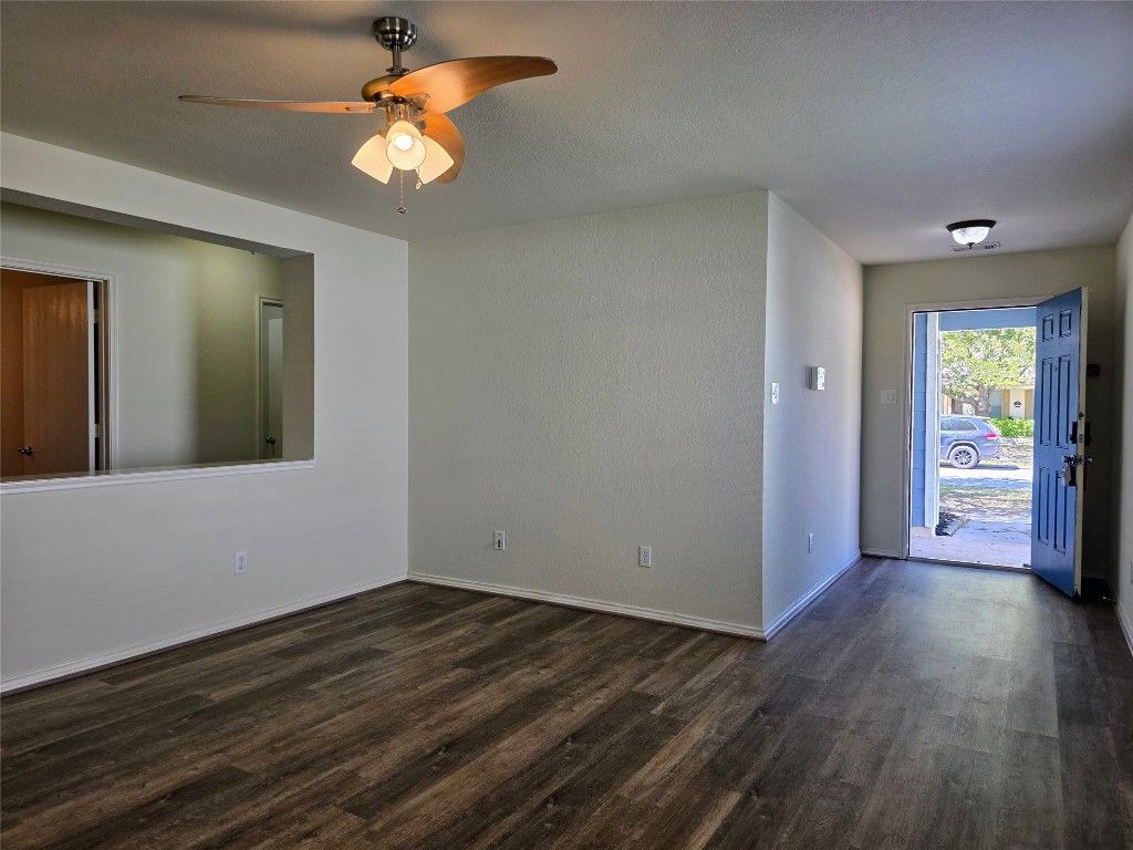 6527 Fairbrook Park Lane Spring, TX 77379 - Photo 9 of 17 a view of an empty room with window and wooden floor