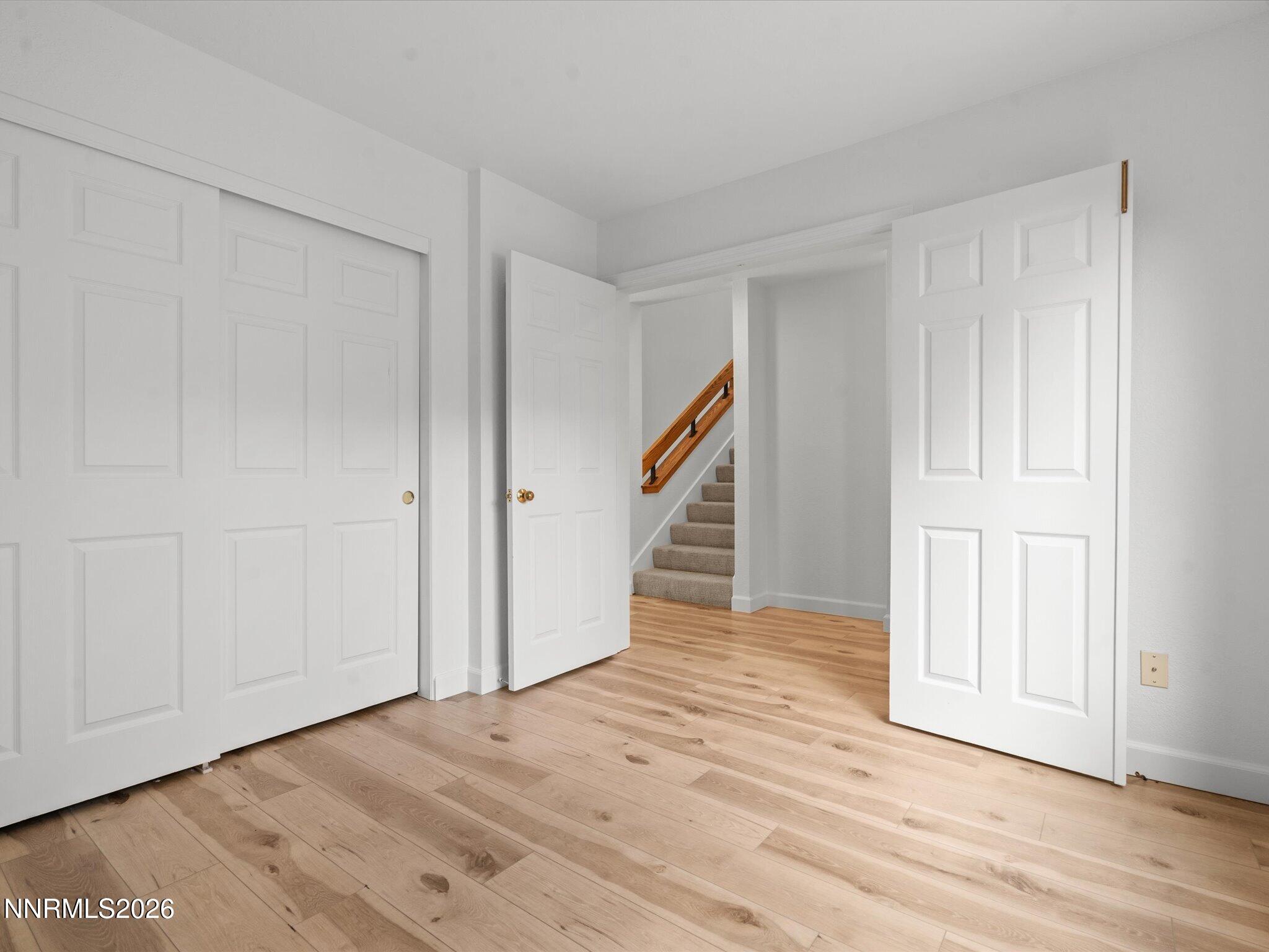 3170 Oakshire Court Reno, NV 89509 - Photo 23 of 43 a view of an empty room with wooden floor and entryway
