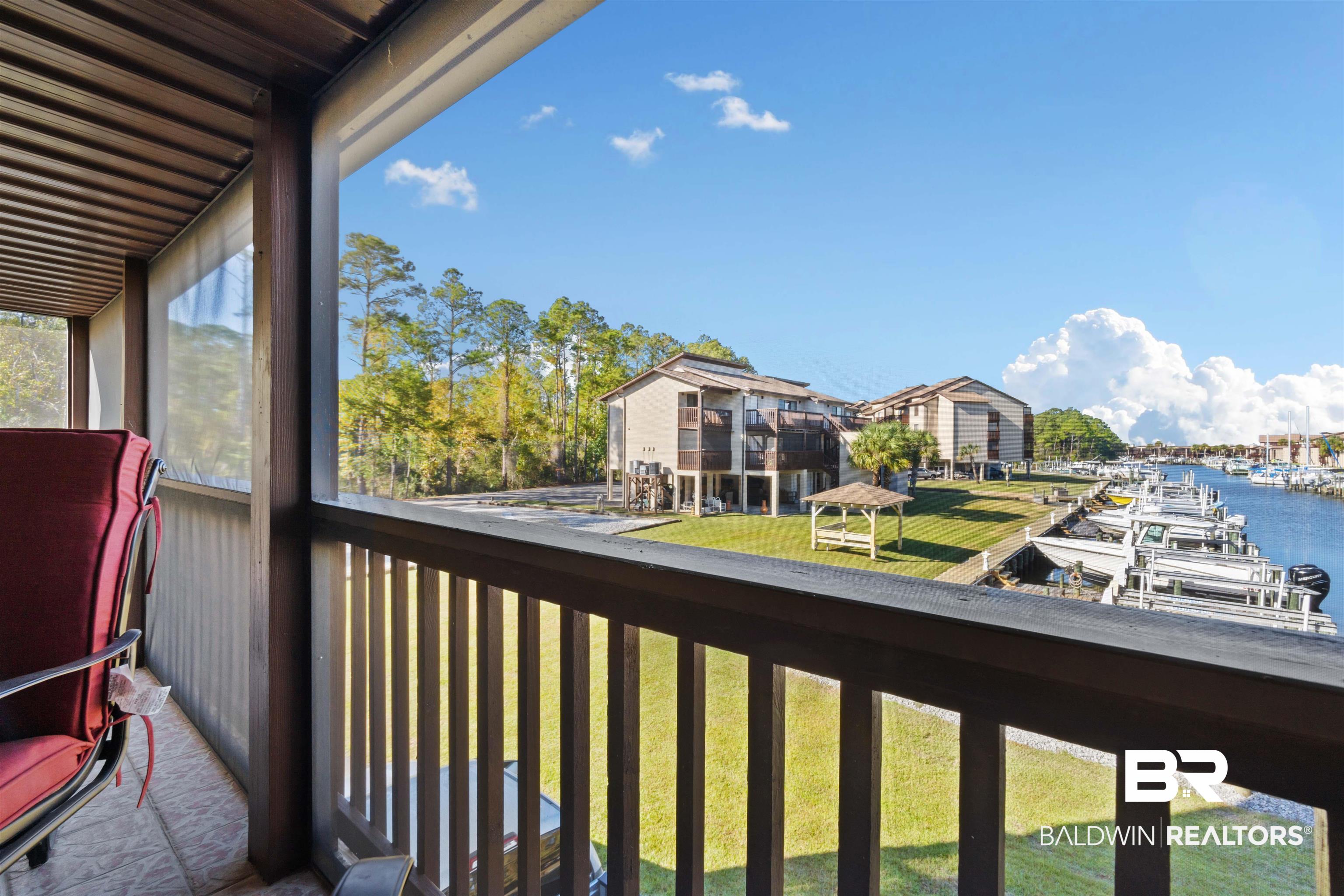 4723 Port Side Lane, Unit 101 Gulf Shores, AL 36542 - Photo 25 of 48 Covered Patio