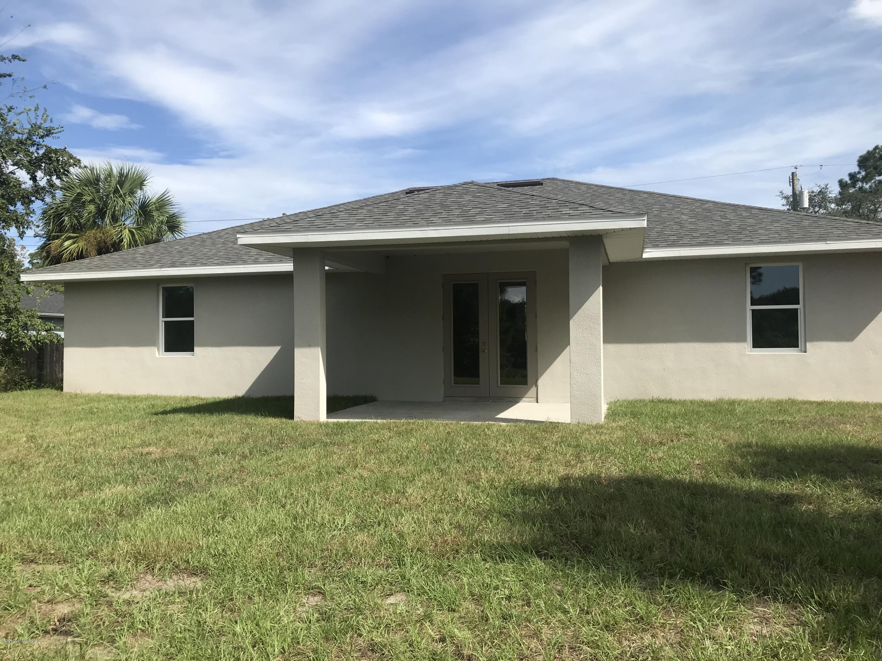 4913 Bridge Road Cocoa, FL 32927 - Photo 2 of 16 Rear View of Home