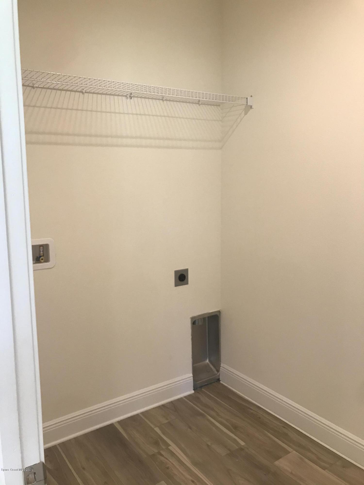 4913 Bridge Road Cocoa, FL 32927 - Photo 15 of 16 Interior Laundry Room