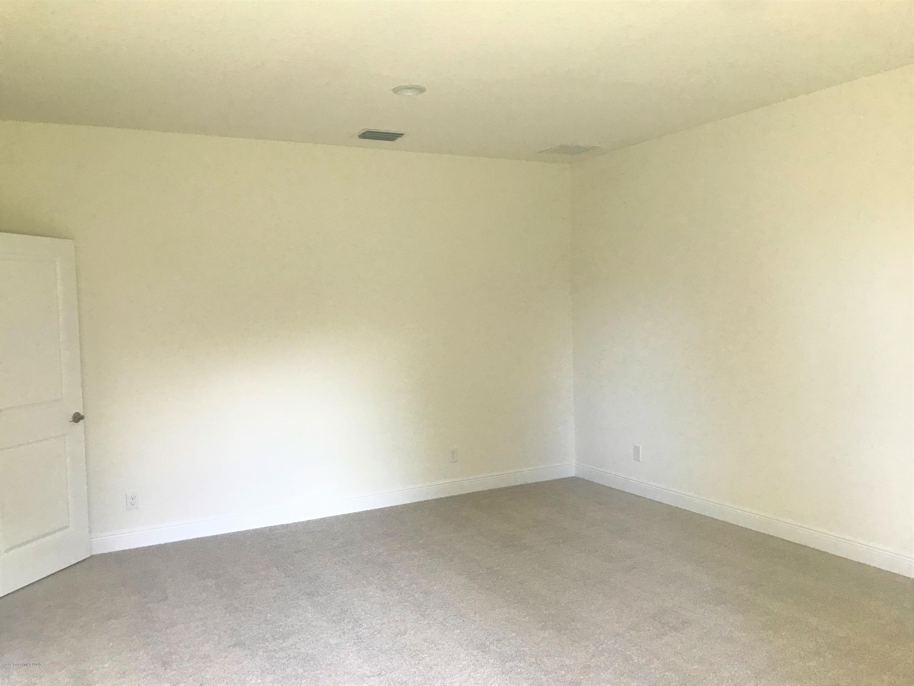4913 Bridge Road Cocoa, FL 32927 - Photo 7 of 16 Large Master Bedroom