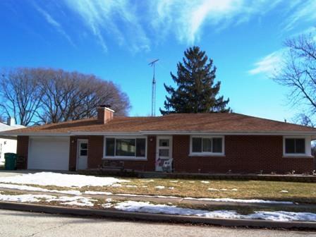 1100 Frederick Street Joliet, IL 60435 - Photo 2 of 15 a view of a house with a swimming pool