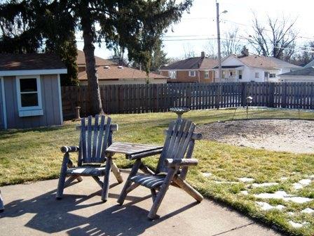 1100 Frederick Street Joliet, IL 60435 - Photo 13 of 15 a view of a swimming pool with a lounge chair