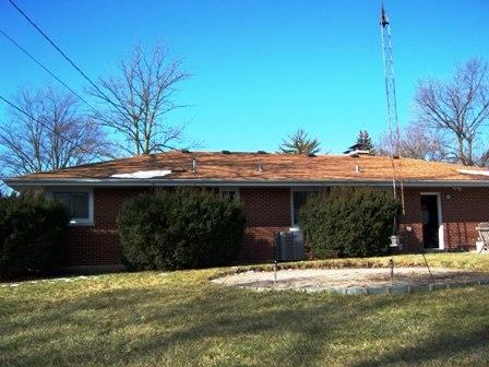 1100 Frederick Street Joliet, IL 60435 - Photo 15 of 15 a front view of a house with a yard