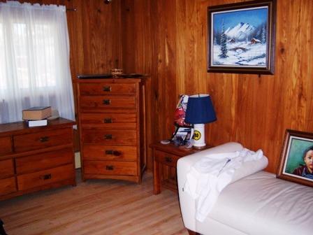 1100 Frederick Street Joliet, IL 60435 - Photo 5 of 15 a bedroom with a bed and furniture