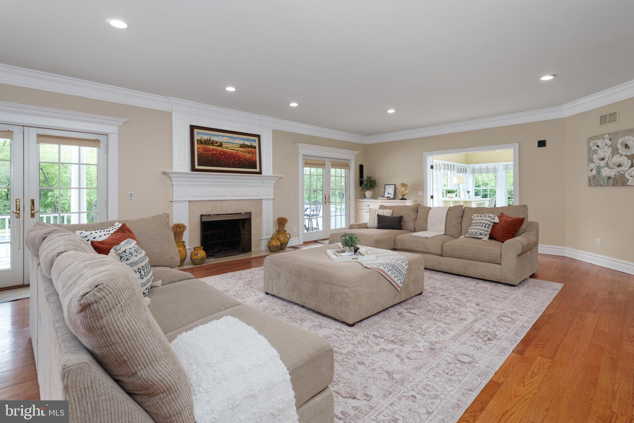 24 Michael Way Pennington, NJ 08534 - Photo 15 of 50 a living room with furniture and a fireplace