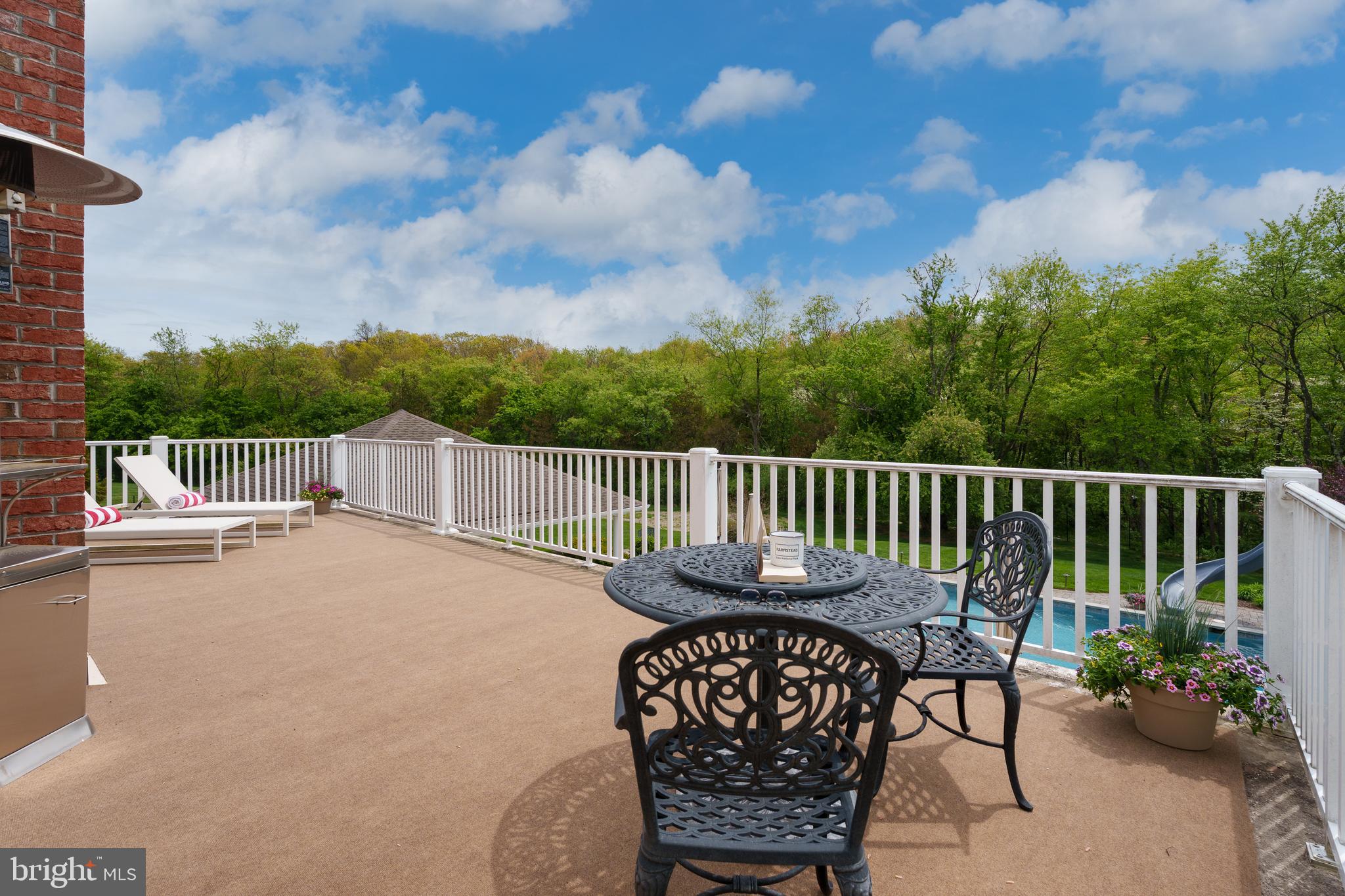 24 Michael Way Pennington, NJ 08534 - Photo 25 of 50 a view of a chairs and table on the terrace