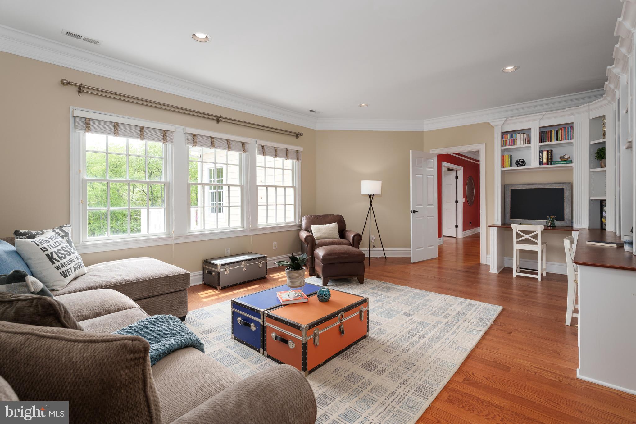 24 Michael Way Pennington, NJ 08534 - Photo 29 of 50 a living room with furniture and a flat screen tv