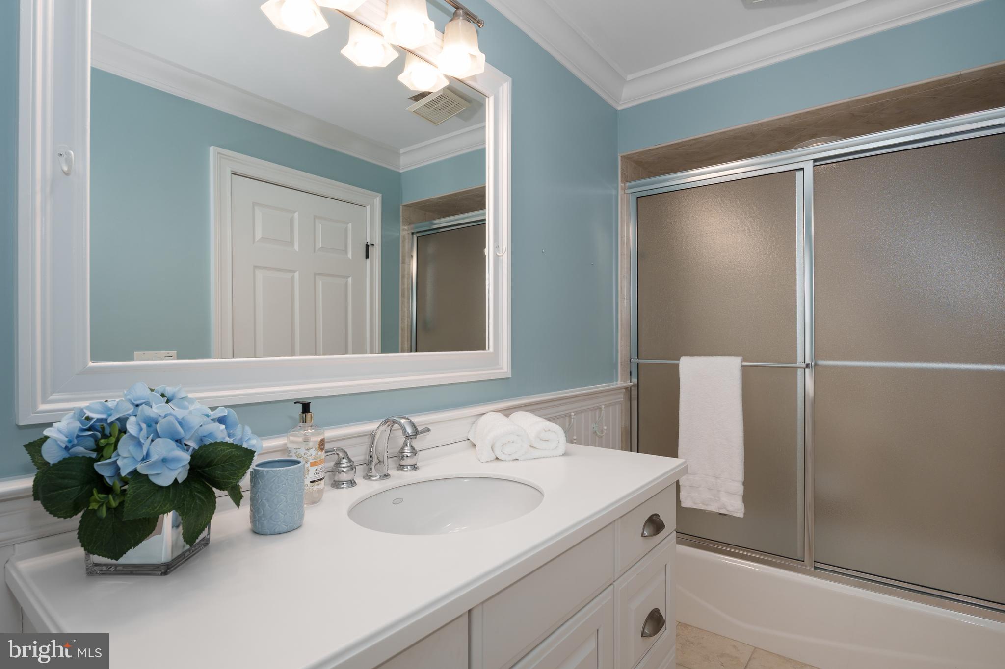 24 Michael Way Pennington, NJ 08534 - Photo 33 of 50 a bathroom with a sink vanity and a mirror