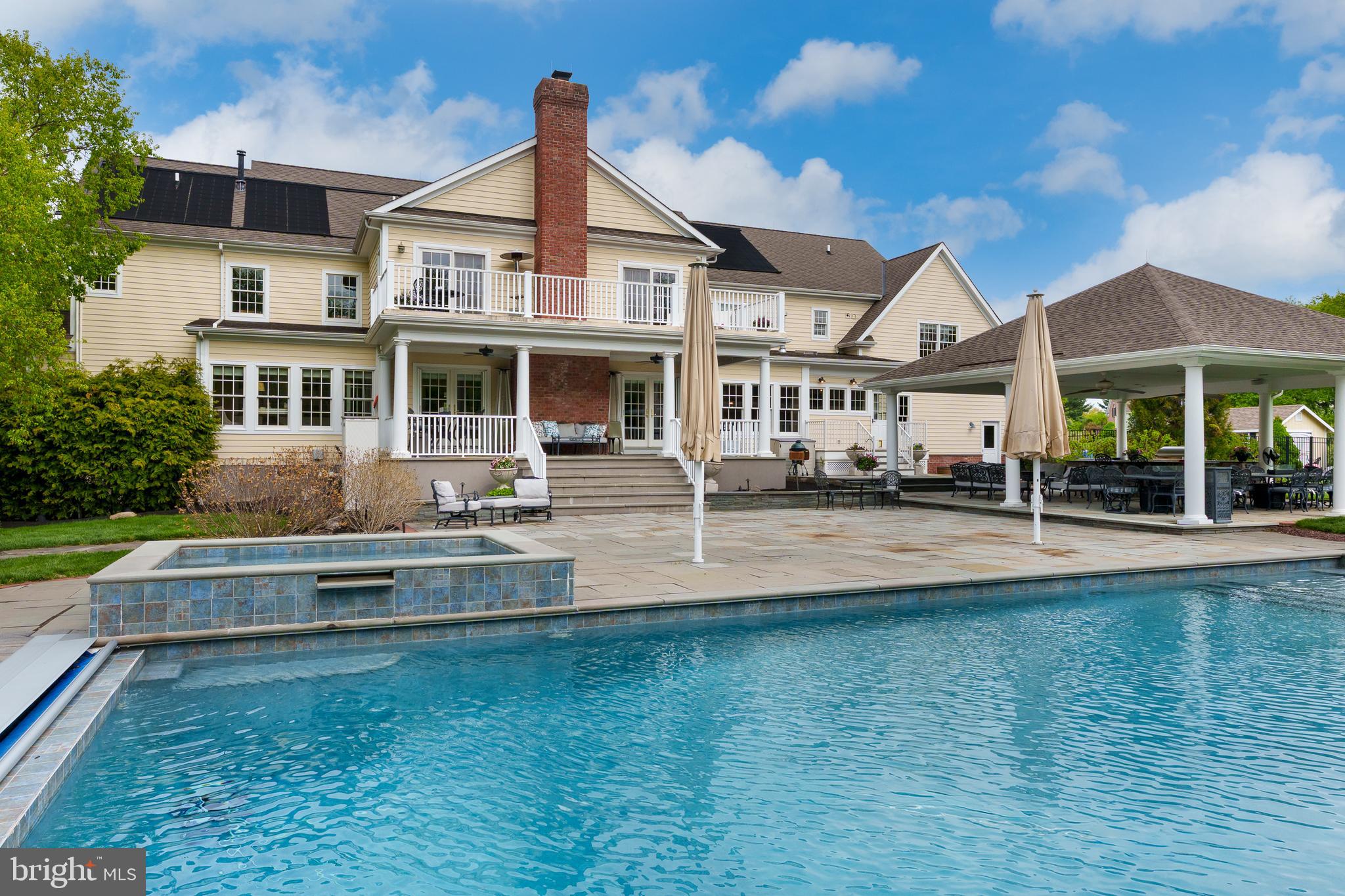 24 Michael Way Pennington, NJ 08534 - Photo 44 of 50 a front view of a house with swimming pool having outdoor seating