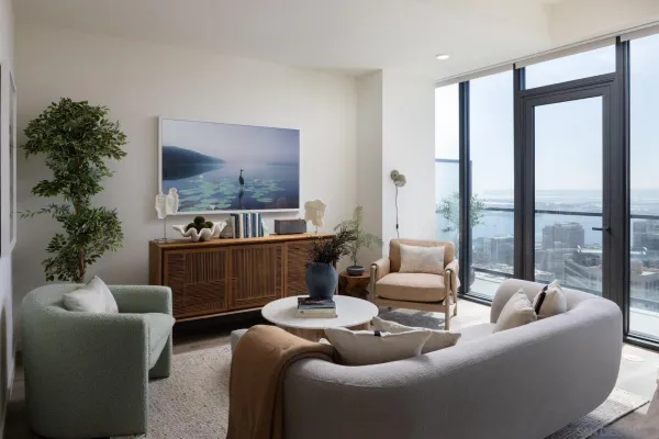 a living room with furniture and a large window