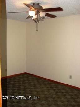 2136 Rothbury Drive Jacksonville, FL 32221 - Photo 14 of 18 a view of a small space with wooden floor