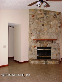 2136 Rothbury Drive Jacksonville, FL 32221 - Photo 5 of 18 a view of fireplace with hallway