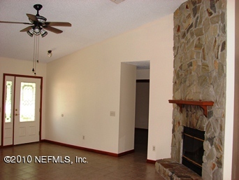 2136 Rothbury Drive Jacksonville, FL 32221 - Photo 6 of 18 a view of an entryway with a chandelier