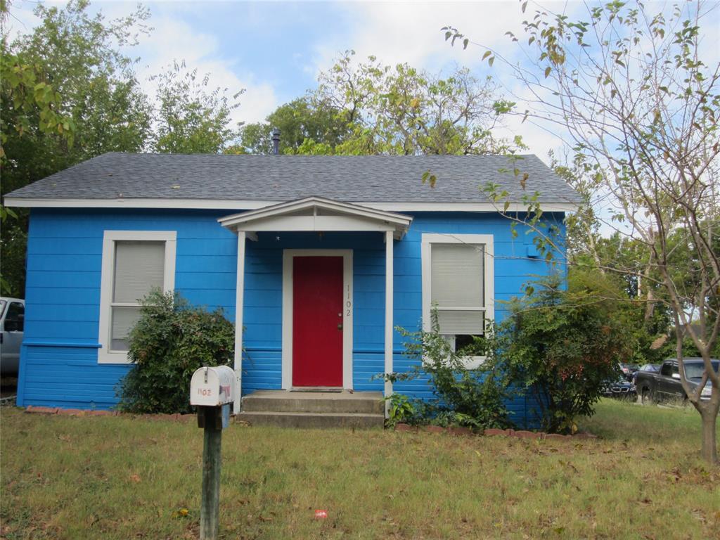 1102 Peak Street Denton, TX 76201 - Photo 1 of 11 a house view with a outdoor space