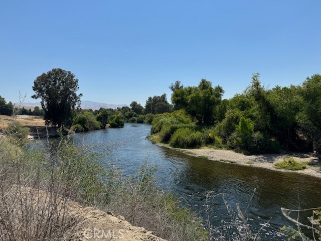 13300 Round Mountain Road Bakersfield, CA 93308 - Photo 7 of 13 a view of a street with a yard